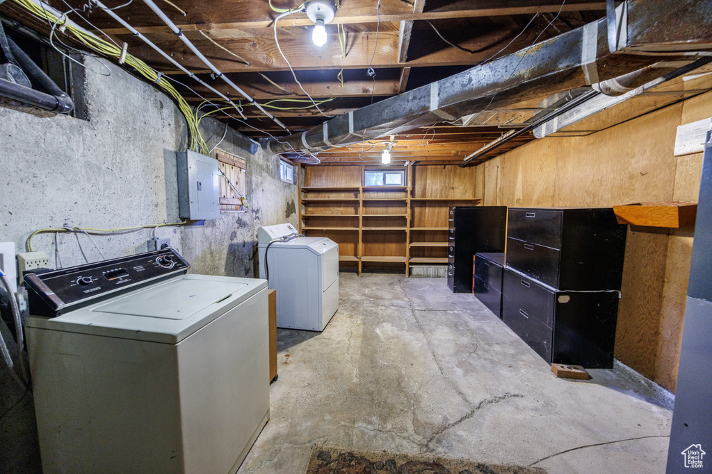 Below grade area with independent washer and dryer and electric panel