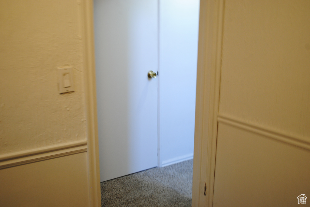 Hallway with carpet