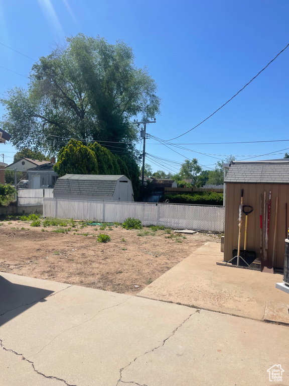 View of yard with a patio