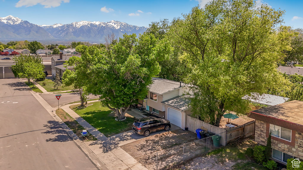 Aerial view of residential area with a mountain backdrop