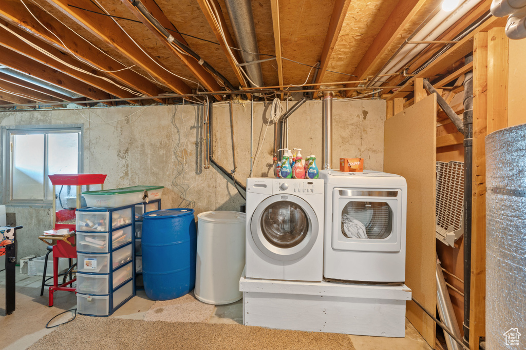 Laundry area featuring separate washer and dryer