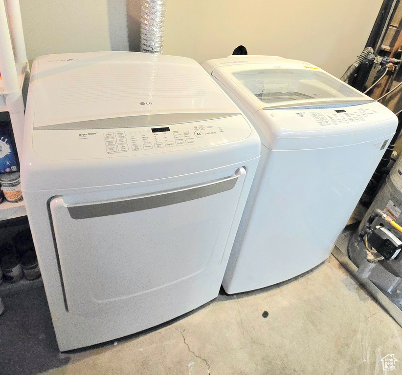 Laundry area with washer and clothes dryer