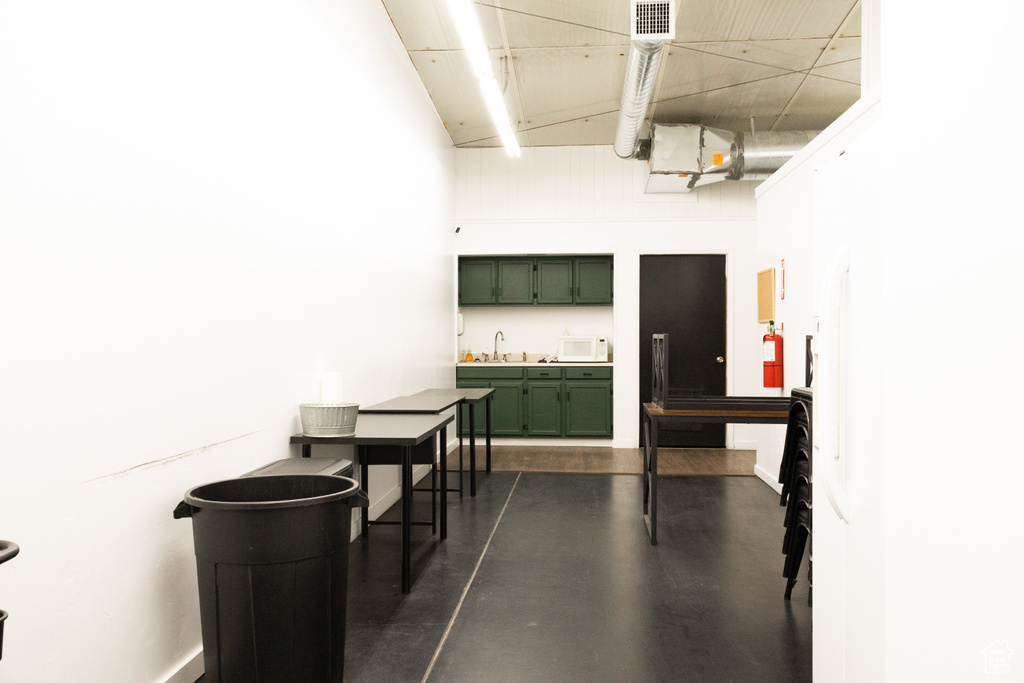 Garage featuring a sink