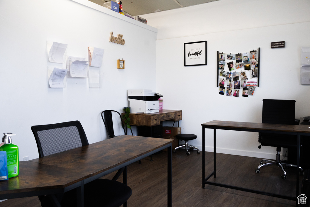 Home office featuring wood finished floors