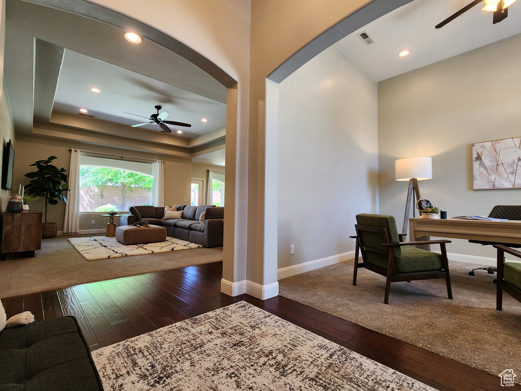 Office with ceiling fan, dark wood-type flooring, baseboards, and recessed lighting
