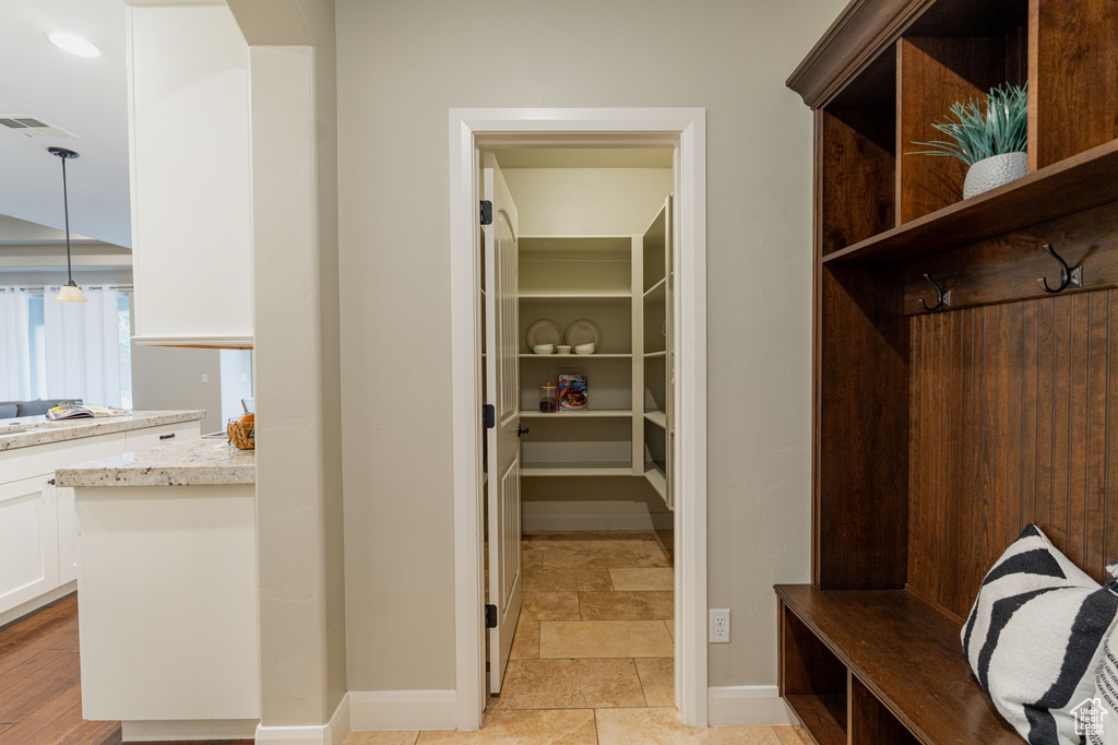 Mudroom featuring baseboards