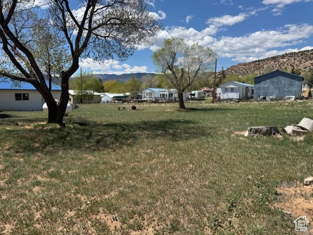 View of yard with a mountain view