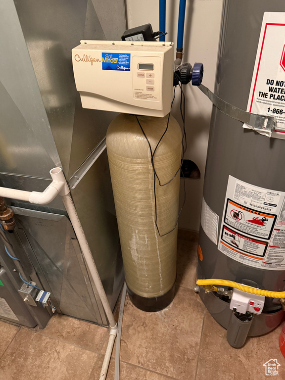 Utilities with strapped water heater
