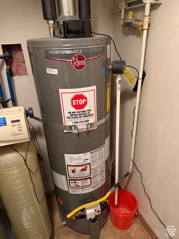 Utilities featuring strapped water heater