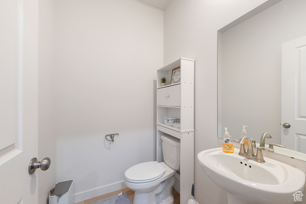 Bathroom with a sink and toilet