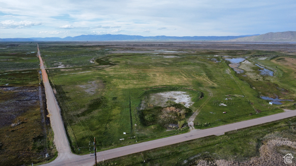 Aerial view of property's location featuring a water and mountain view