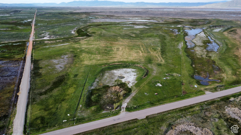Aerial overview of property's location with a water and mountain view