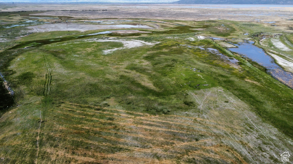 Aerial overview of property's location featuring a nearby body of water