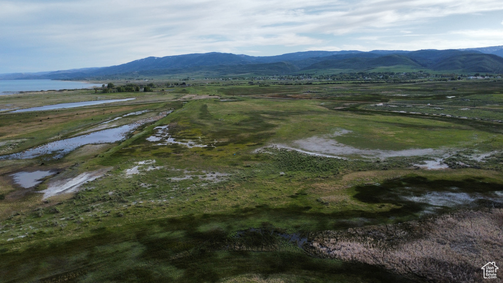 Mountain view featuring a nearby body of water
