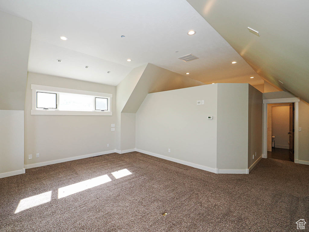 Bonus room with carpet flooring, vaulted ceiling, recessed lighting, and baseboards