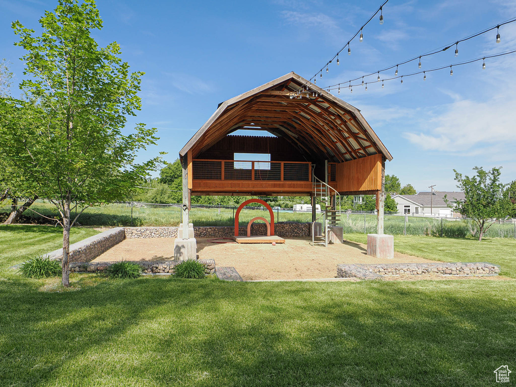 View of community with a lawn and a gazebo