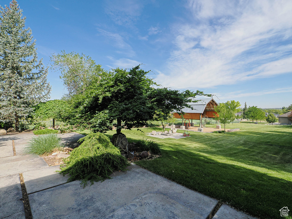 View of green lawn with a gazebo