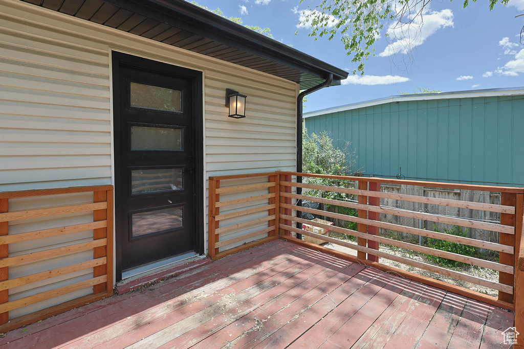 Property entrance featuring a deck
