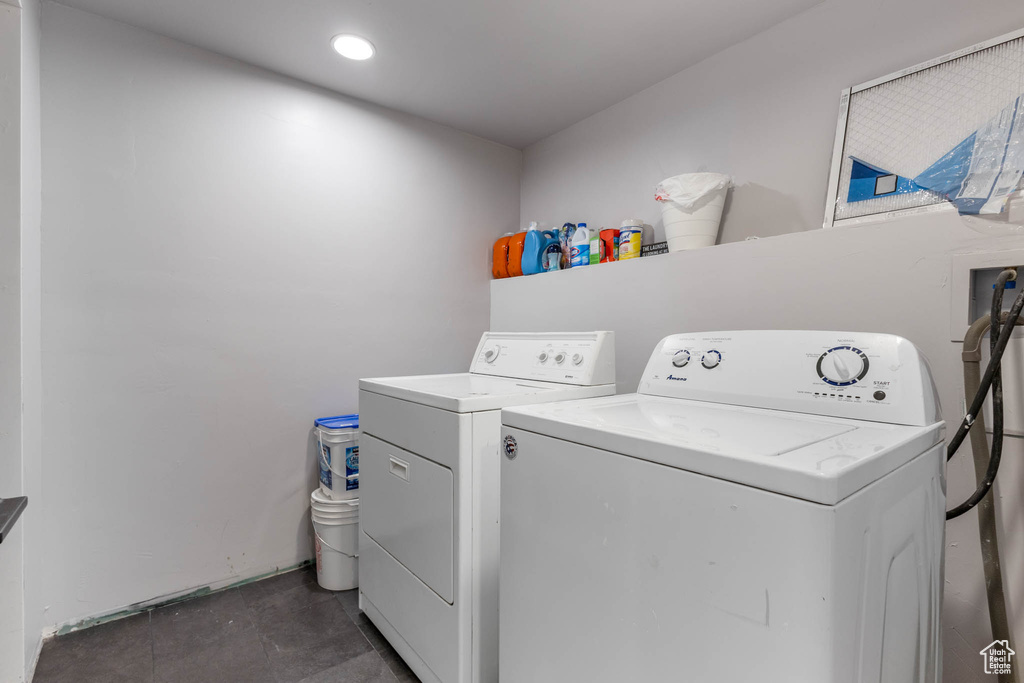 Washroom with washer and dryer and recessed lighting