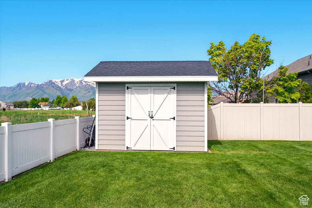 View of shed with a mountain view