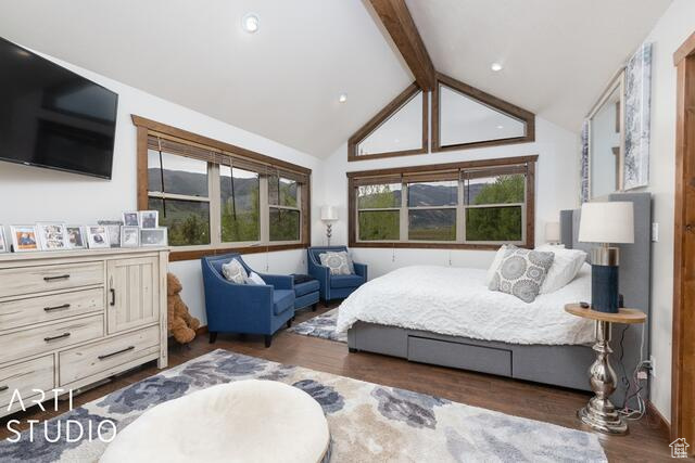 Bedroom featuring wood finished floors, multiple windows, and recessed lighting
