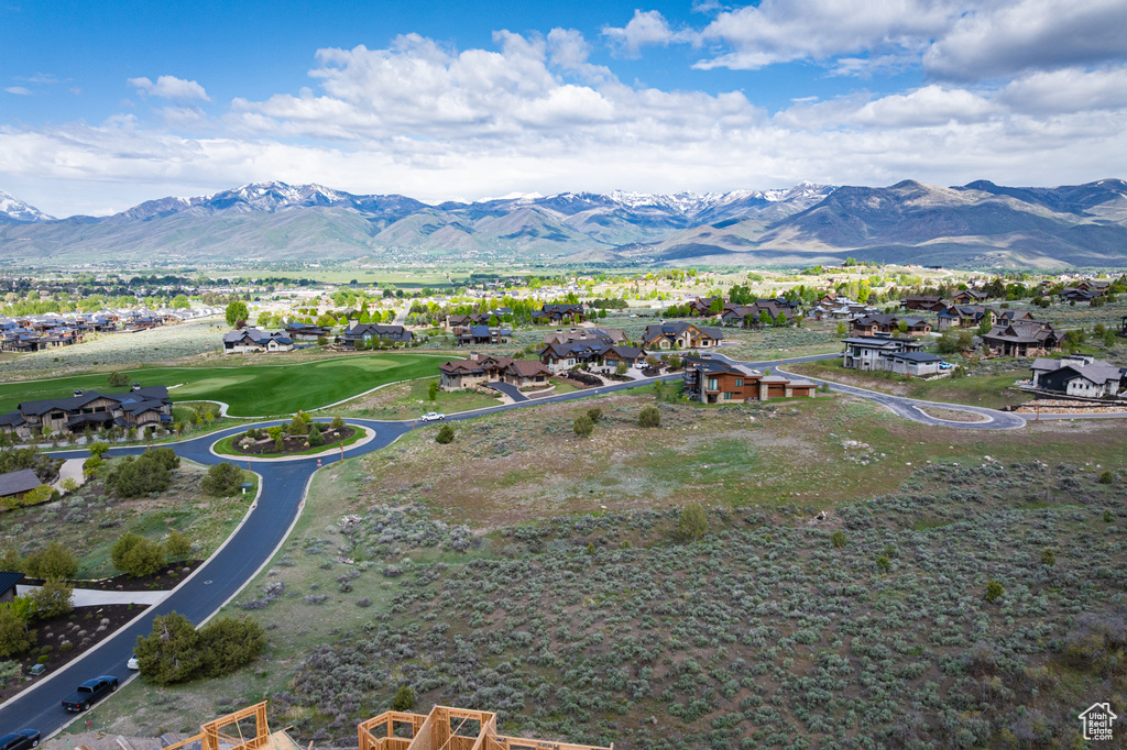 View of mountain backdrop with nearby suburban area and a local golf course