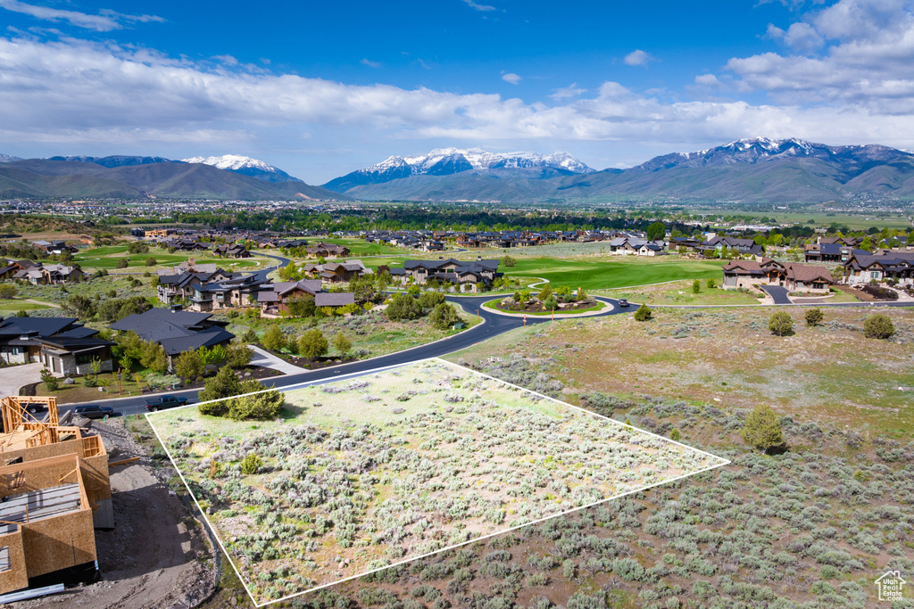 View of mountain backdrop with nearby suburban area