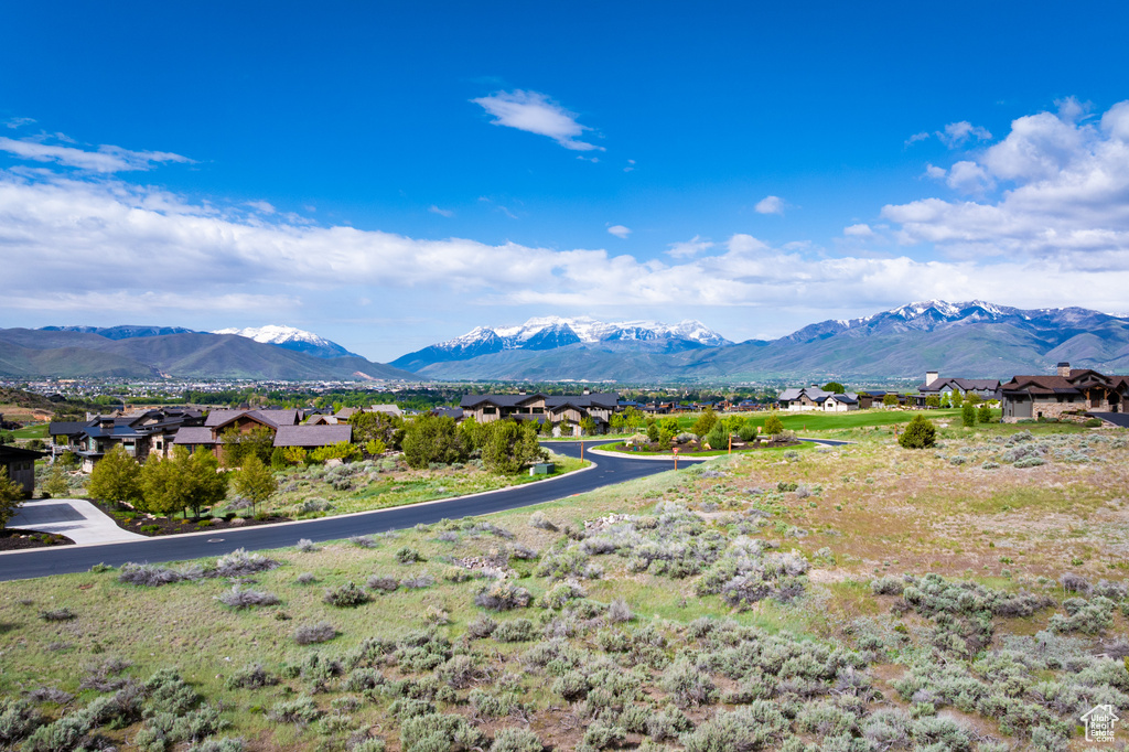 View of mountain backdrop with nearby suburban area