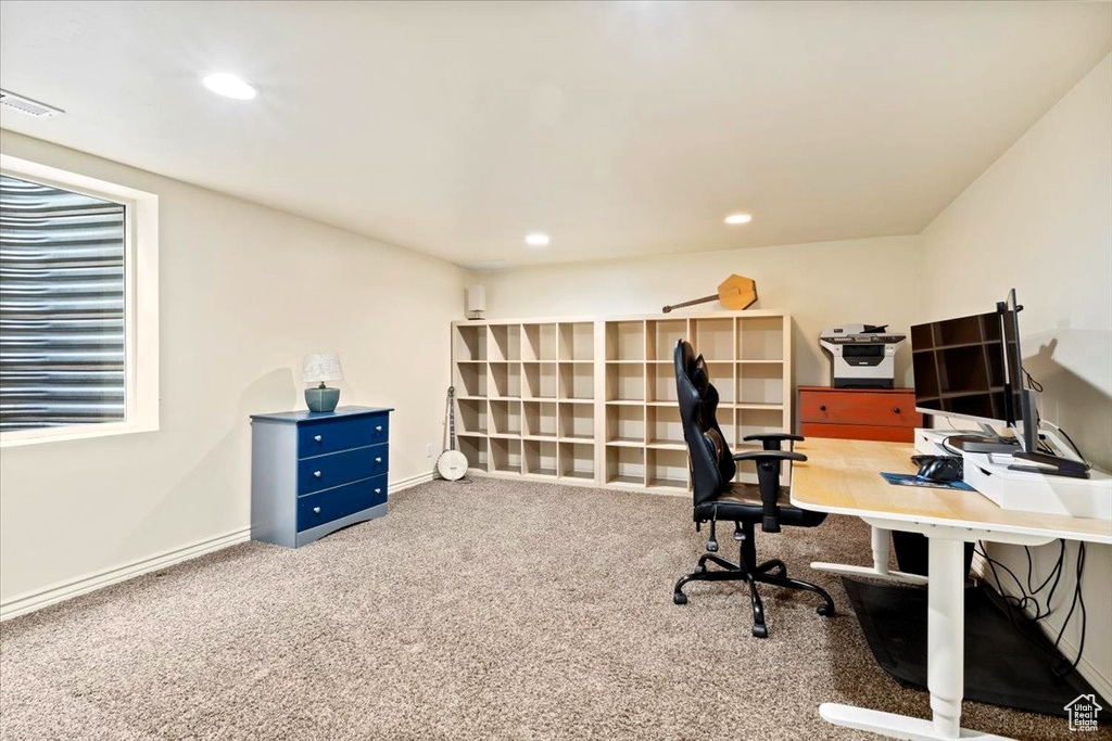 Carpeted home office featuring recessed lighting and baseboards