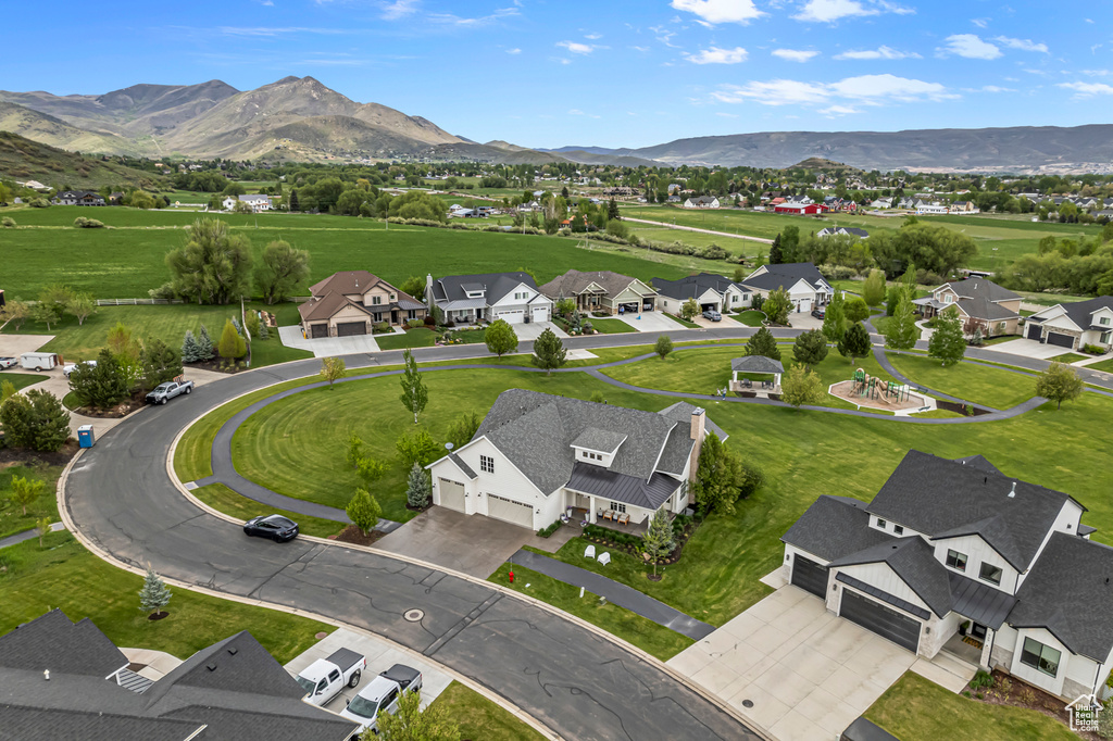 Aerial view of residential area with mountains