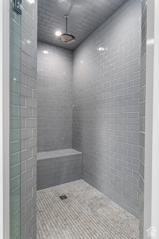 Bathroom with a tile shower