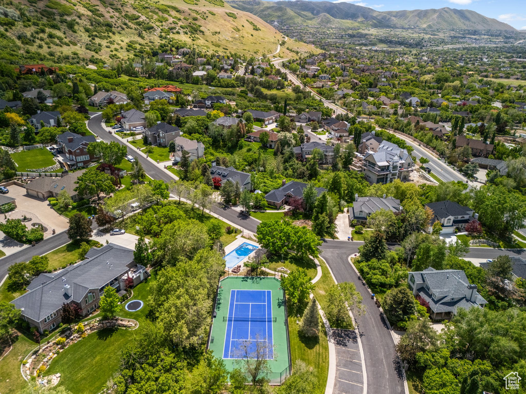 View of property location with nearby suburban area and mountains