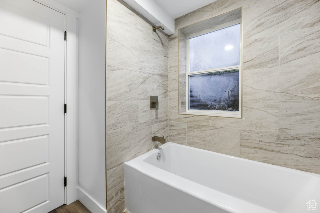 Bathroom with wood finished floors