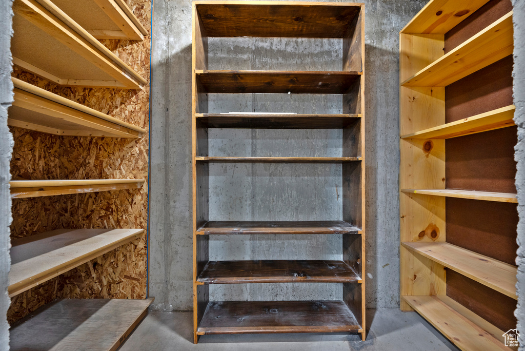 Stairway with unfinished concrete flooring