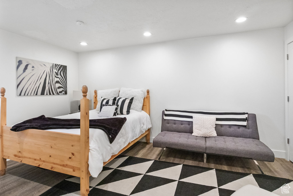 Bedroom featuring recessed lighting and wood finished floors