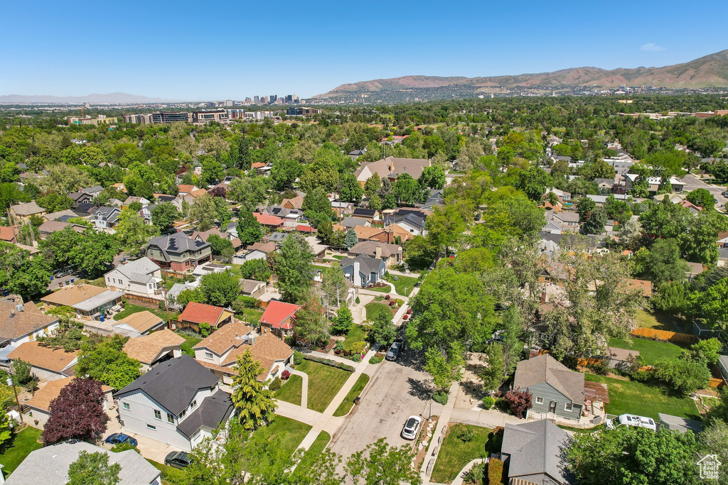Aerial view of property\\\'s location featuring mountains and nearby suburban area