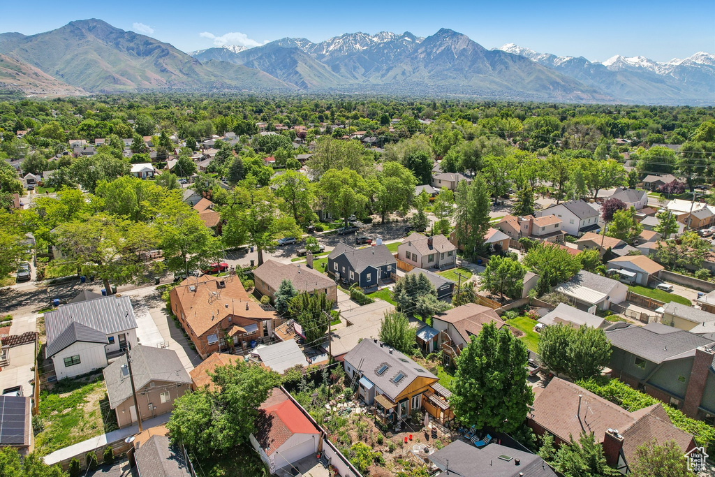 Aerial view of residential area with a mountain backdrop