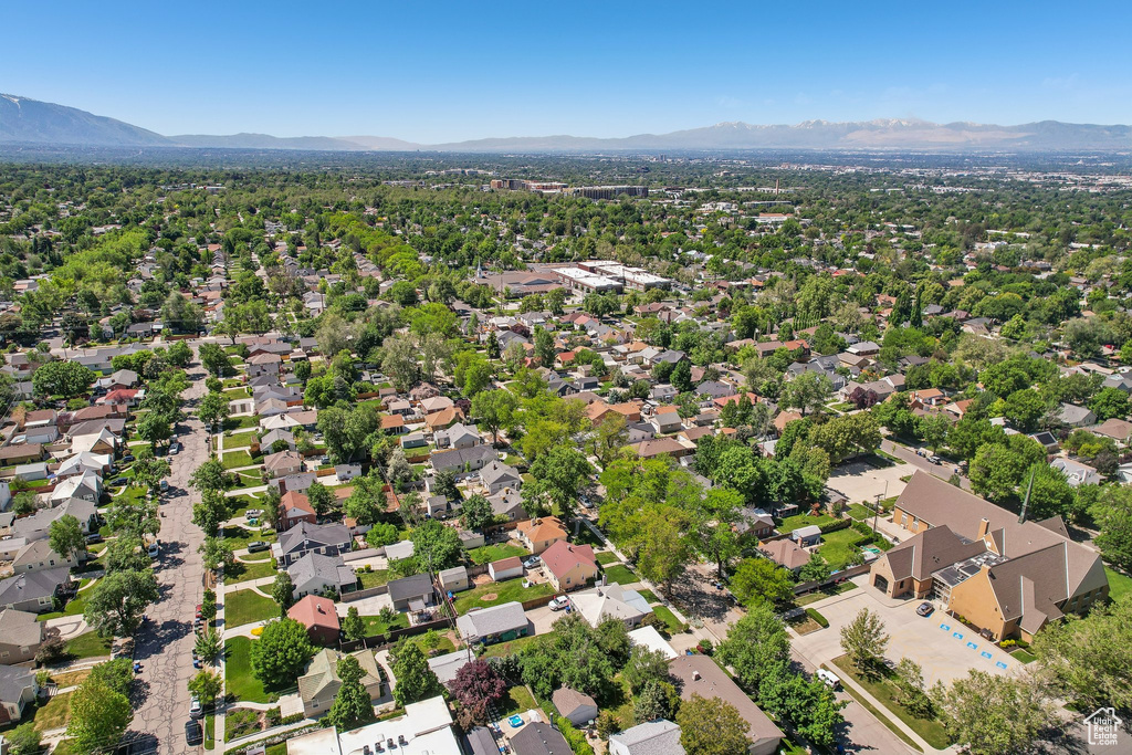 Aerial view of residential area with mountains