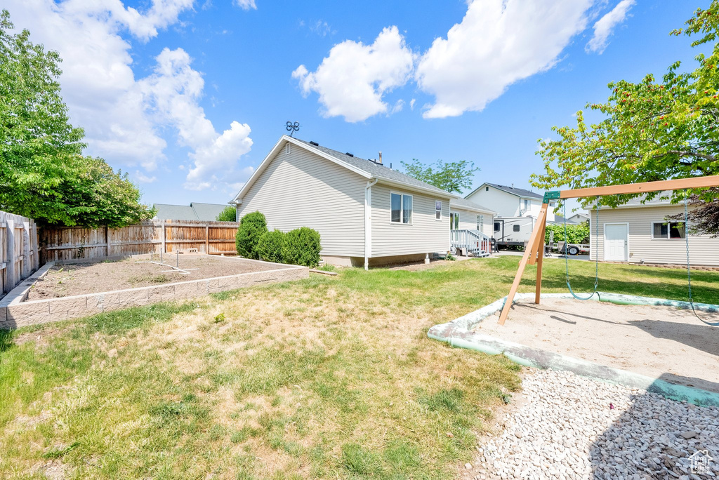 View of yard with a vegetable garden