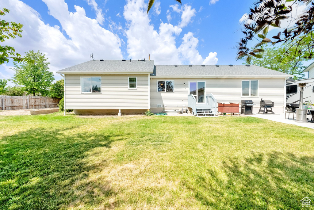 Back of property featuring a patio
