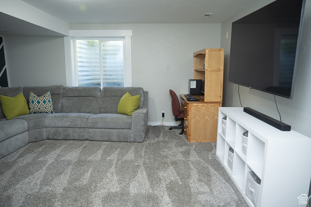 Living room with light colored carpet