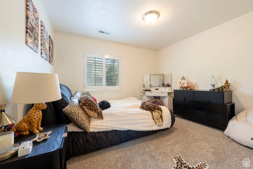 Bedroom with carpet floors
