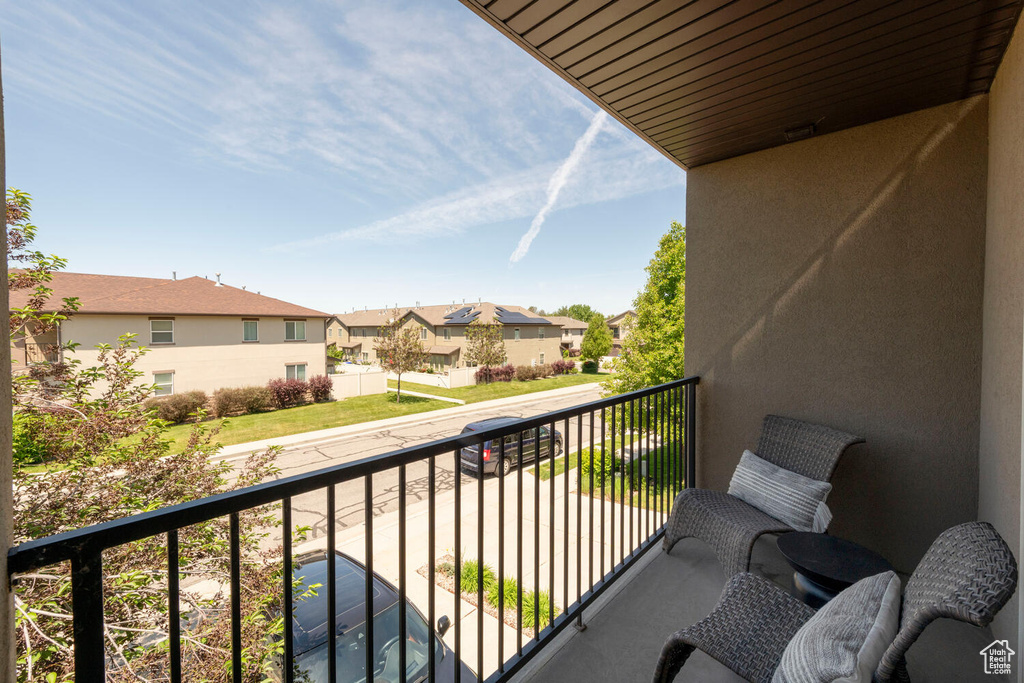 Balcony featuring a residential view