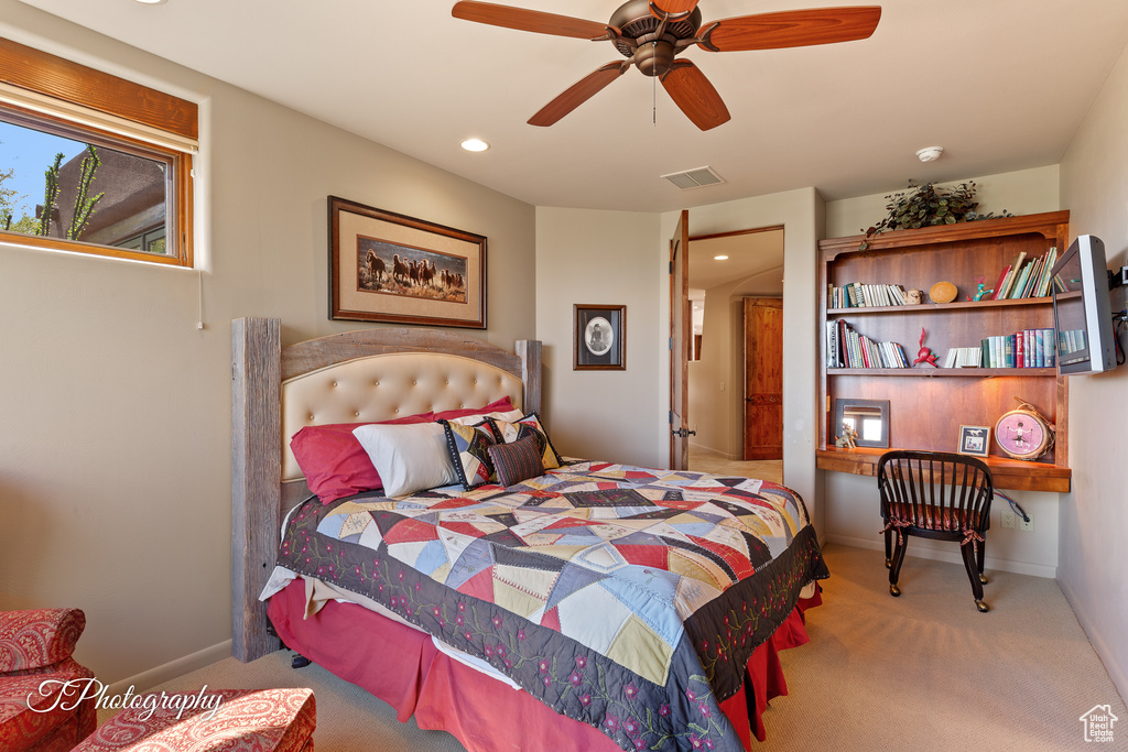 Carpeted bedroom with recessed lighting, baseboards, and ceiling fan