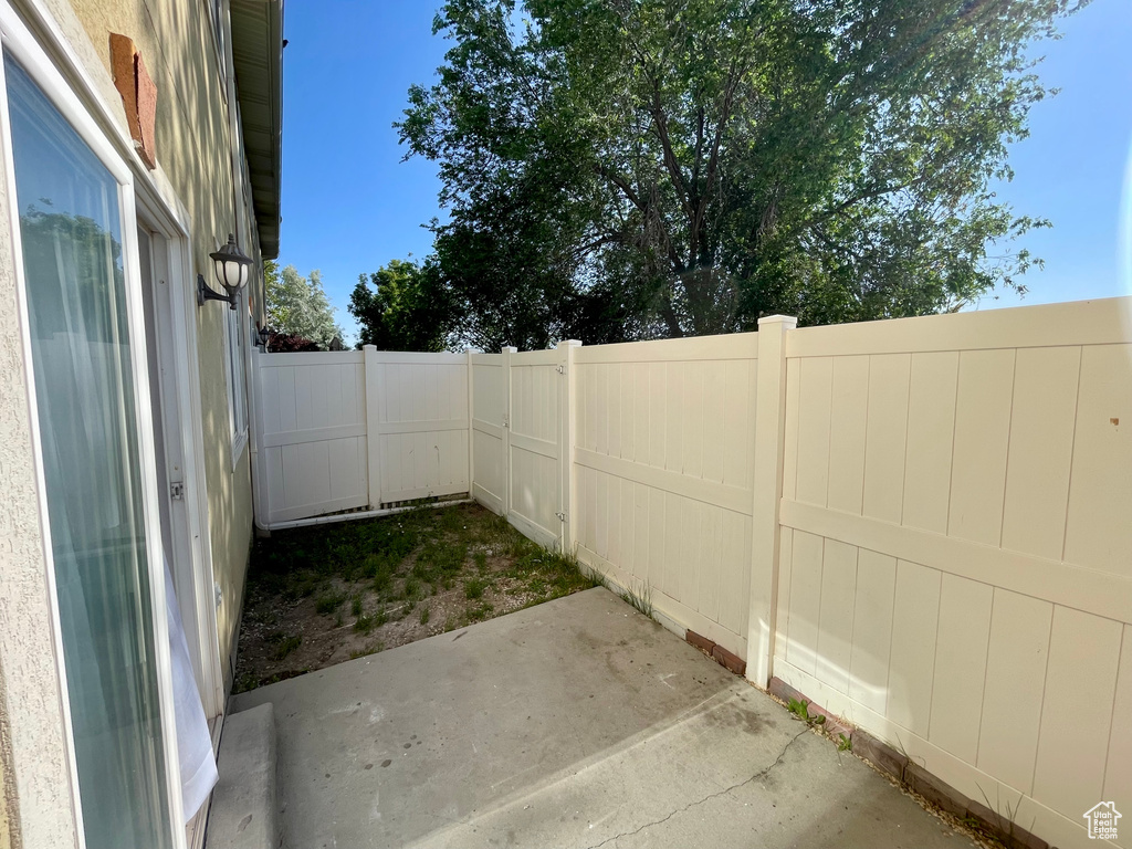 Fenced backyard featuring a patio area