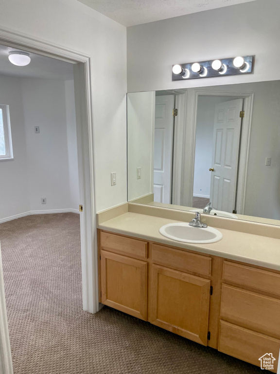 Bathroom featuring vanity