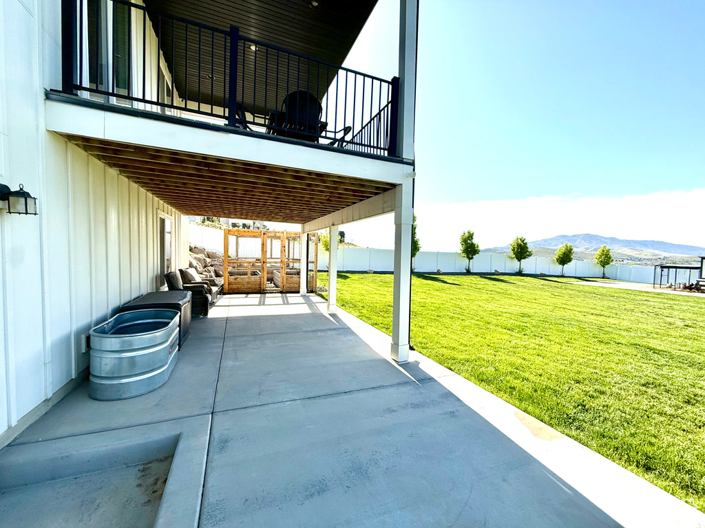 View of parking / parking lot with a mountain view