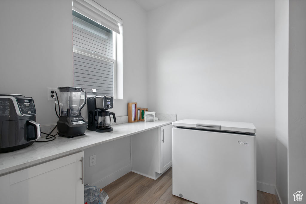 Office featuring light wood-type flooring