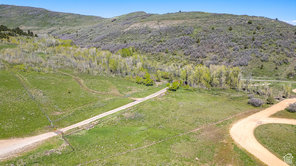 Aerial overview of property\\\\\\\'s location with a mountainous background
