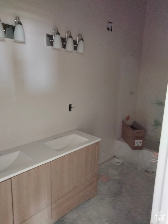 Bathroom featuring double vanity